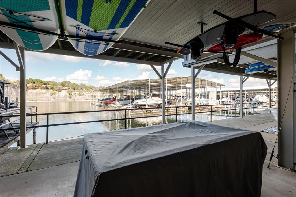 3005 Upcreek Alley, Unit 4 Strawn, TX 76475 - Photo 18 of 29 a view of water heater room with furniture