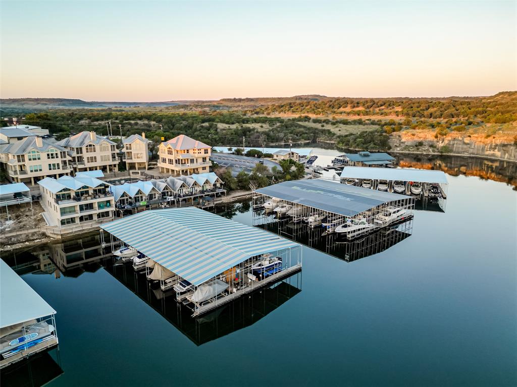 3005 Upcreek Alley, Unit 4 Strawn, TX 76475 - Photo 4 of 29 a view of a terrace with a city view
