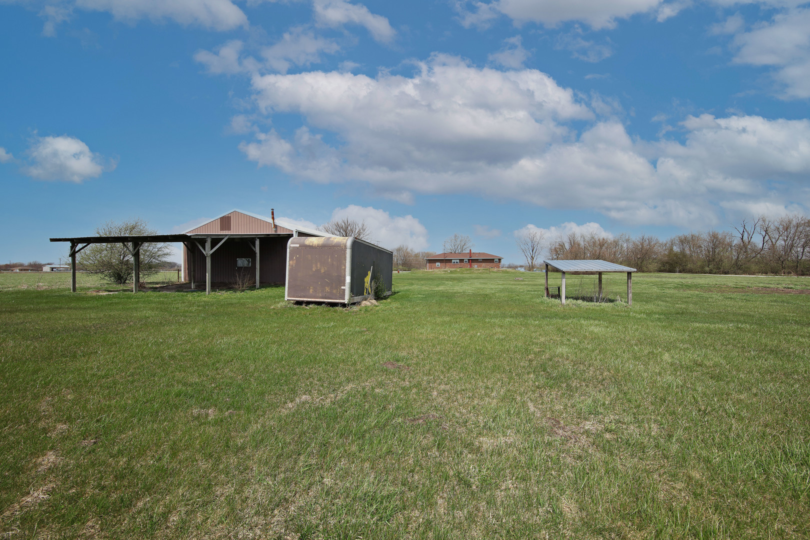 23525 Widows Road Wilmington, IL 60481 - Photo 15 of 17 a view of a house with a backyard