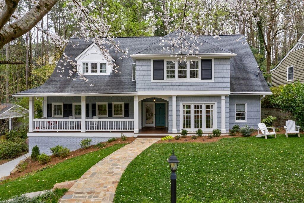 Beautiful Traditional home with welcoming front porch and yard.