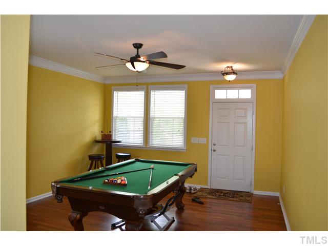 5853 Parkchester Road Raleigh, NC 27616 - Photo 12 of 19 a room with wooden floor and a window