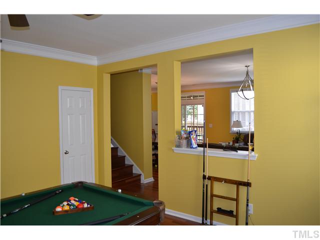 5853 Parkchester Road Raleigh, NC 27616 - Photo 13 of 19 a view of a living room with a table and chairs