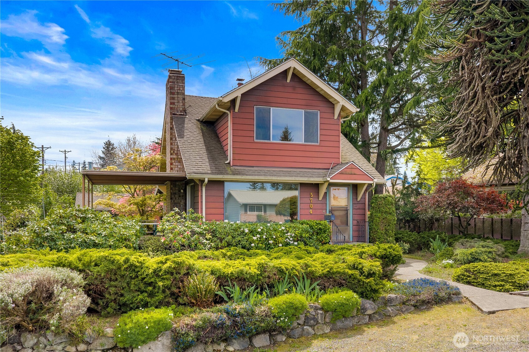 5704 North Ruby Street Tacoma, WA 98407 - Photo 1 of 38 a view of a house with yard and plants