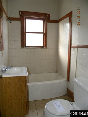 845 Wheeler Avenue Reno, NV 89502 - Photo 6 of 8 a bathroom with a sink toilet and shower