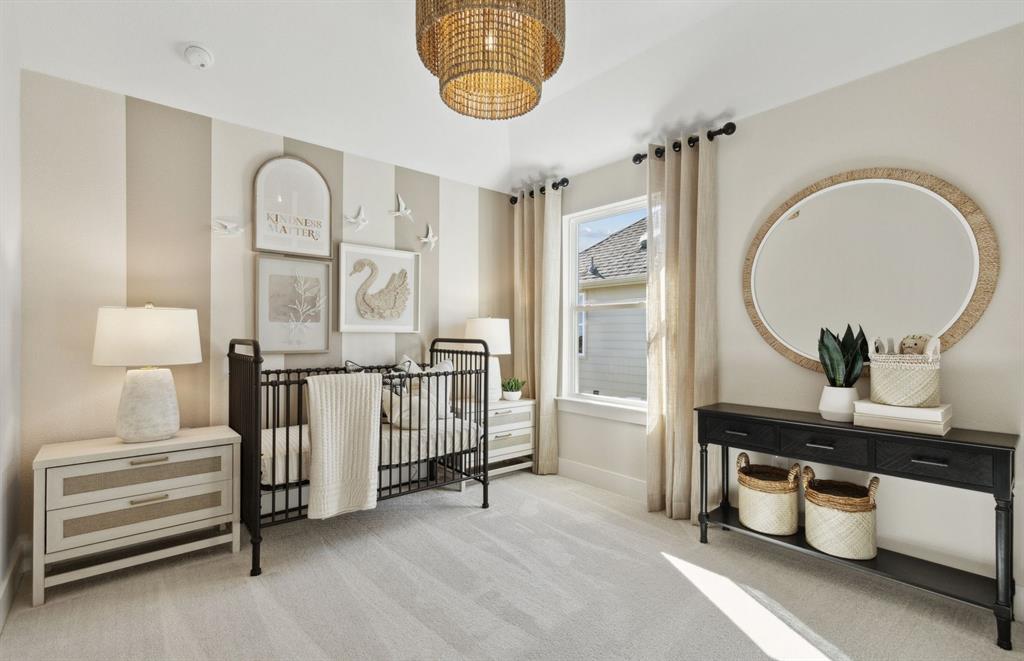 11129 Carham Street Haslet, TX 76052 - Photo 16 of 19 a view of hall way with furniture and chandelier