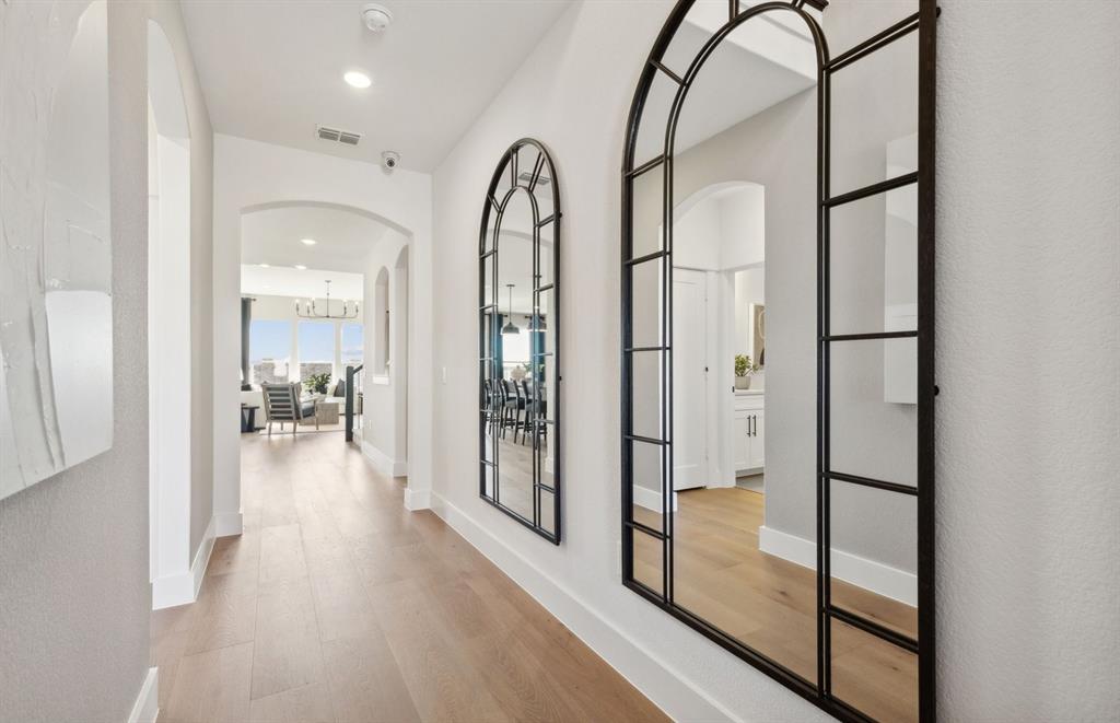 11129 Carham Street Haslet, TX 76052 - Photo 2 of 19 a view of entryway and hall with wooden floor
