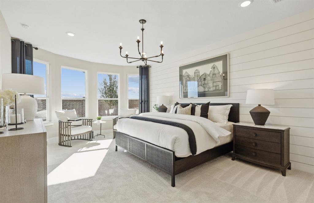 11129 Carham Street Haslet, TX 76052 - Photo 9 of 19 a spacious bedroom with a bed and window