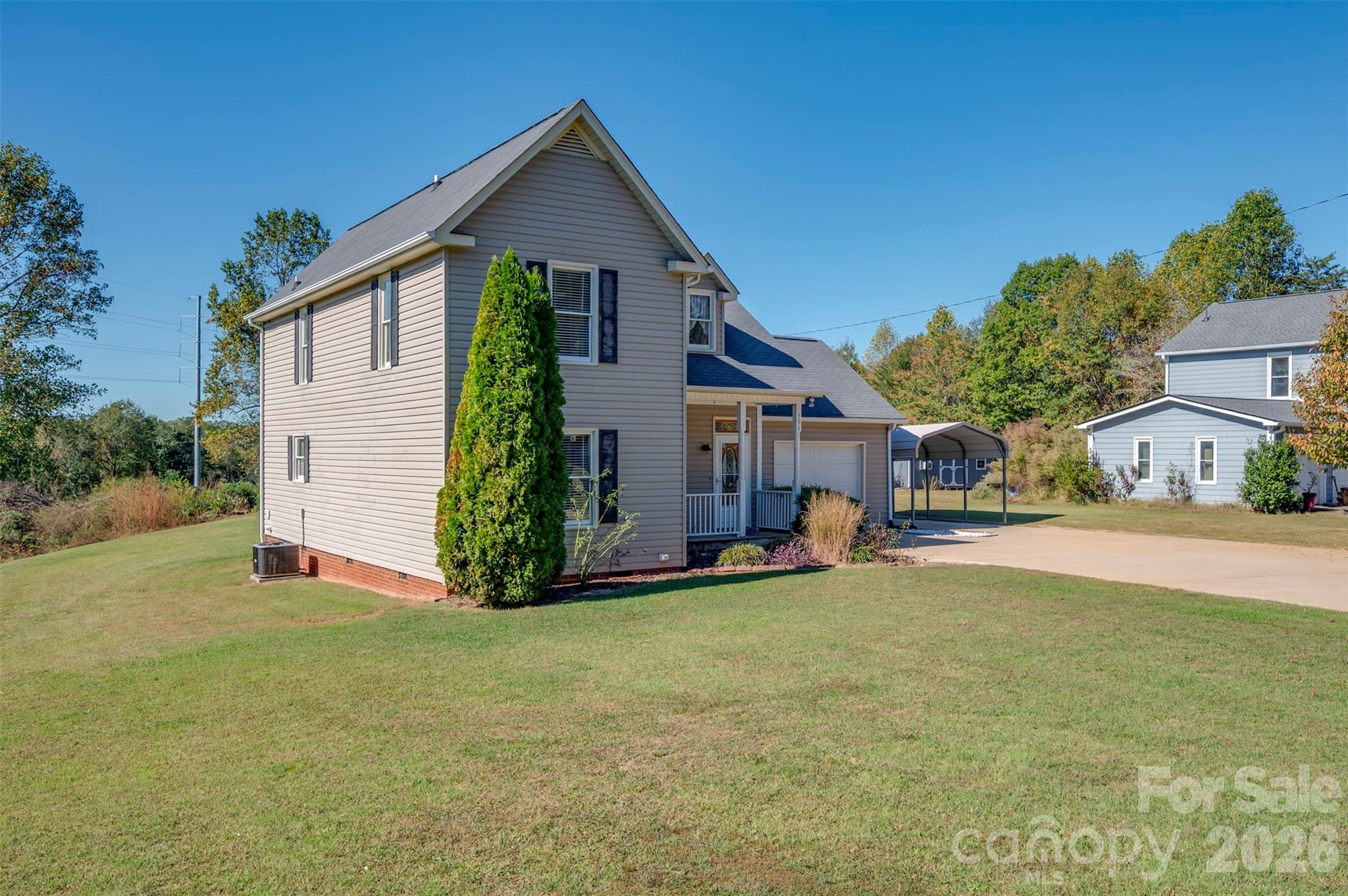 506 Pleasant Street Spindale, NC 28160 - Photo 32 of 42 a view of a house with a yard and garage