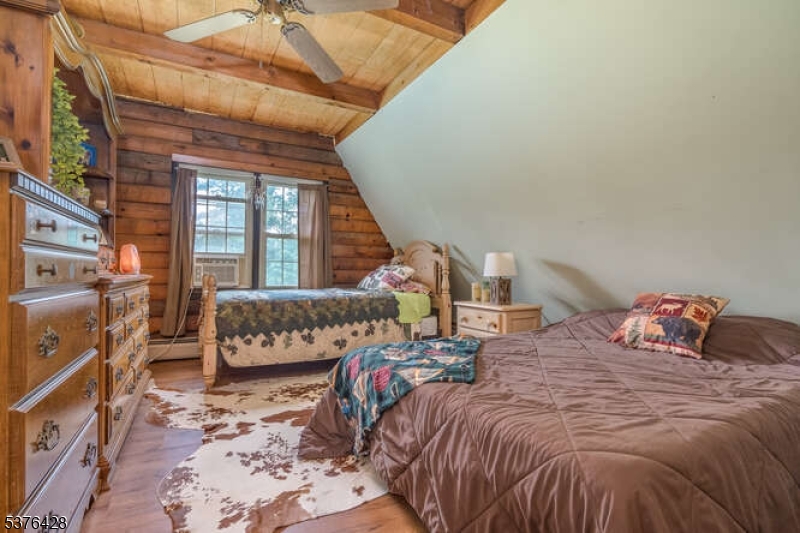 153 Hammar Road Frenchtown, NJ 08825 - Photo 12 of 24 a bed sitting in a bedroom next to a window