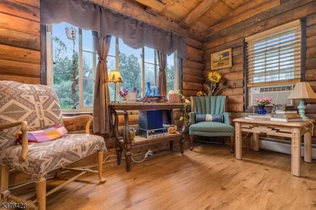 a outdoor living space with furniture and a fireplace