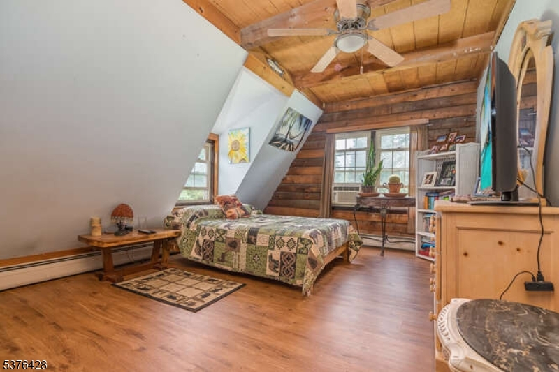 153 Hammar Road Frenchtown, NJ 08825 - Photo 16 of 24 a living room with furniture and a wooden floor