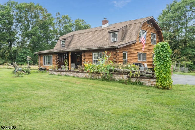 153 Hammar Road Frenchtown, NJ 08825 - Photo 2 of 24 a front view of a house with a yard