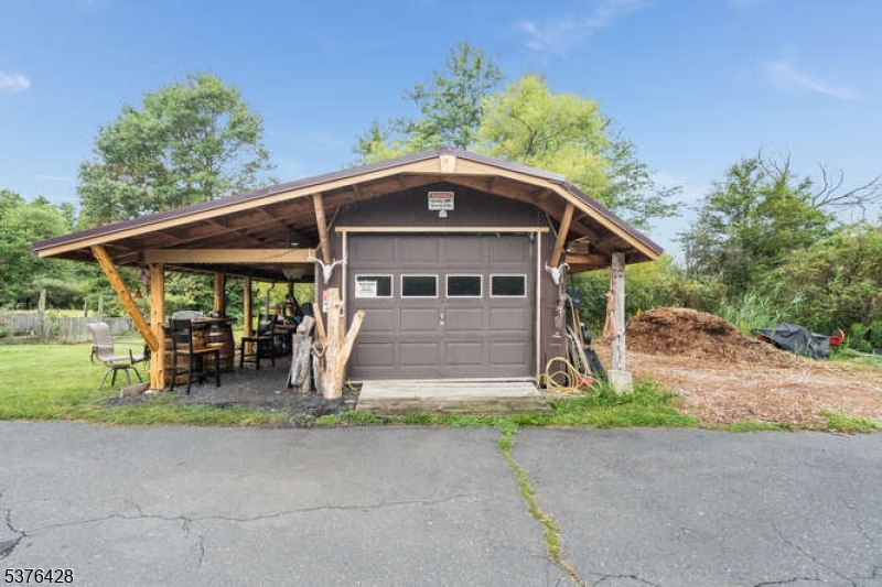 153 Hammar Road Frenchtown, NJ 08825 - Photo 23 of 24 a front view of a house with garden