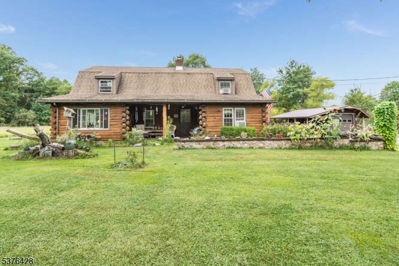 153 Hammar Road Frenchtown, NJ 08825 - Photo 24 of 24 a front view of house with outdoor seating and yard
