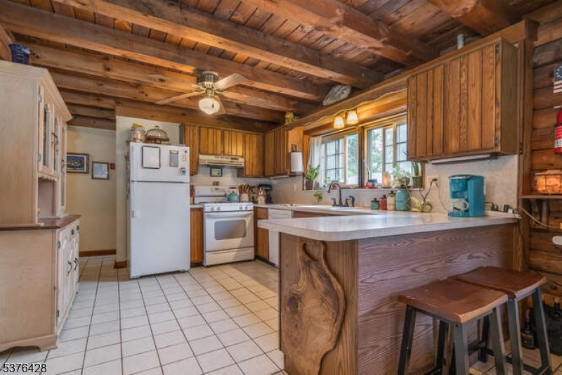 153 Hammar Road Frenchtown, NJ 08825 - Photo 4 of 24 a kitchen with a sink appliances and cabinets