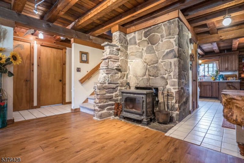 153 Hammar Road Frenchtown, NJ 08825 - Photo 8 of 24 a view of empty room with wooden floor and fireplace