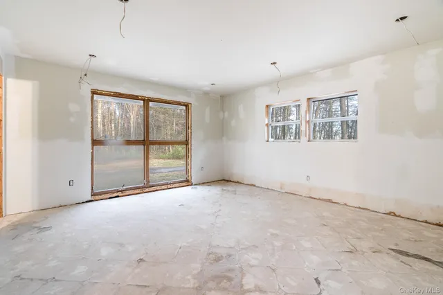 a bathroom with a sink mirror and vanity