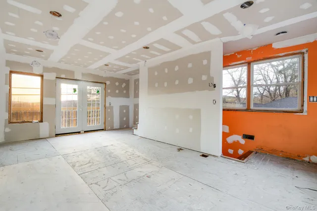 a view of a balcony with wooden floor