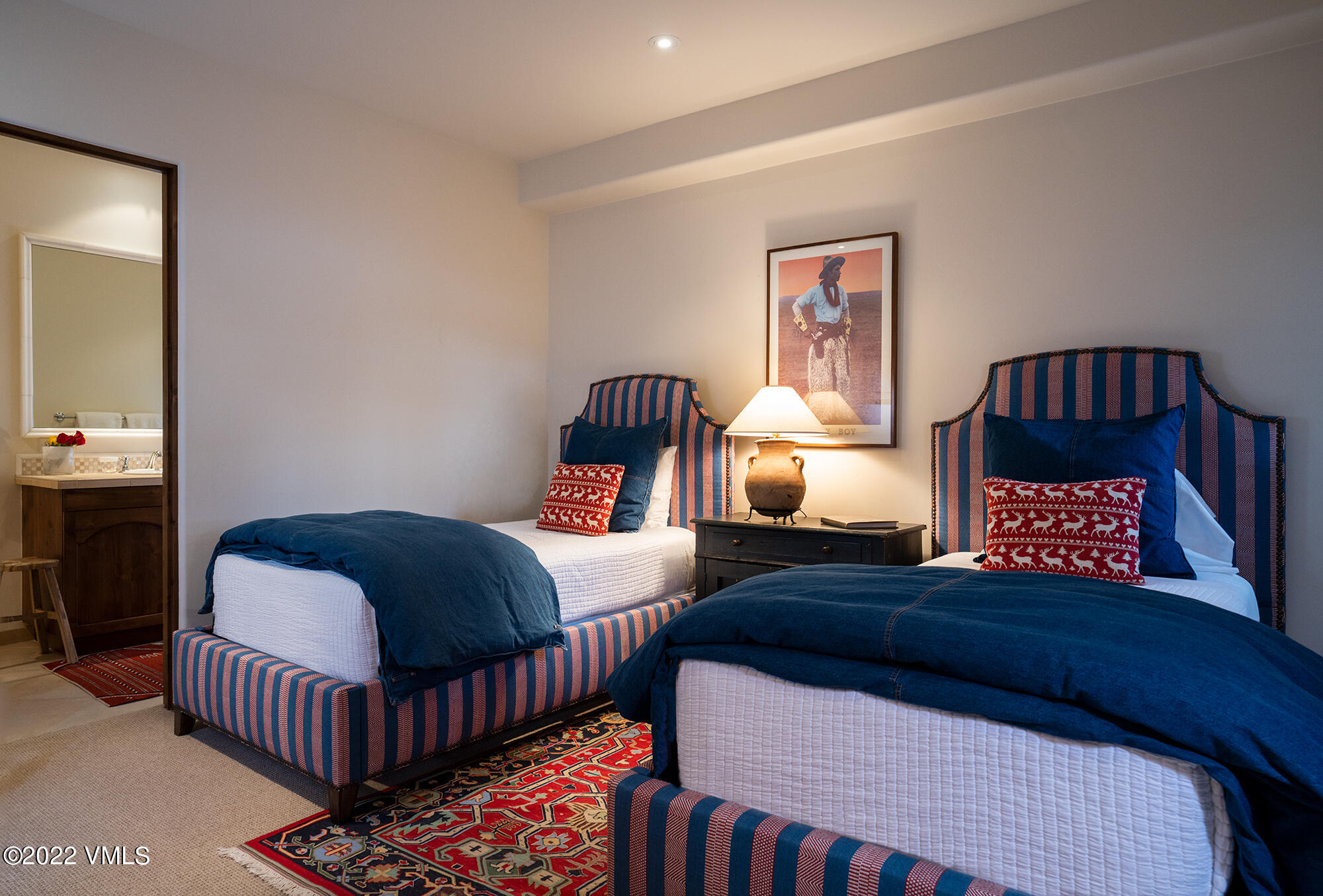 151 Vail Road, Unit 12 Vail, CO 81657 - Photo 14 of 22 a bedroom with a bed and window