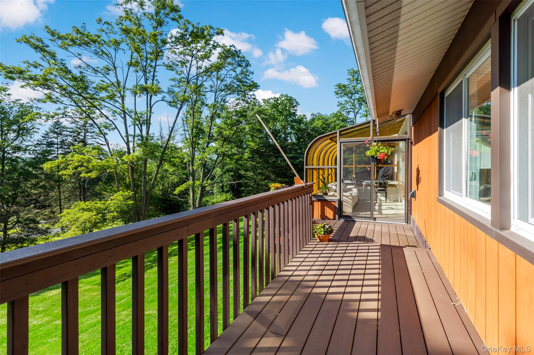 207 East Hook Road Hopewell Junction, NY 12533 - Photo 13 of 41 a view of balcony with wooden floor and fence