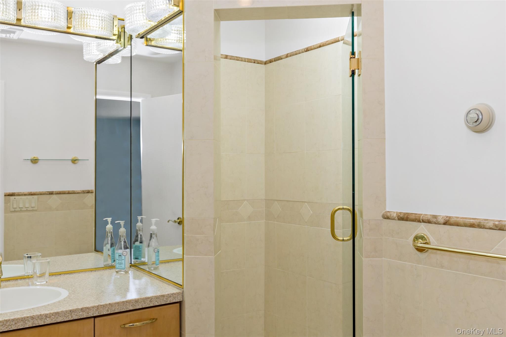 207 East Hook Road Hopewell Junction, NY 12533 - Photo 20 of 41 a bathroom with a shower sink and mirror