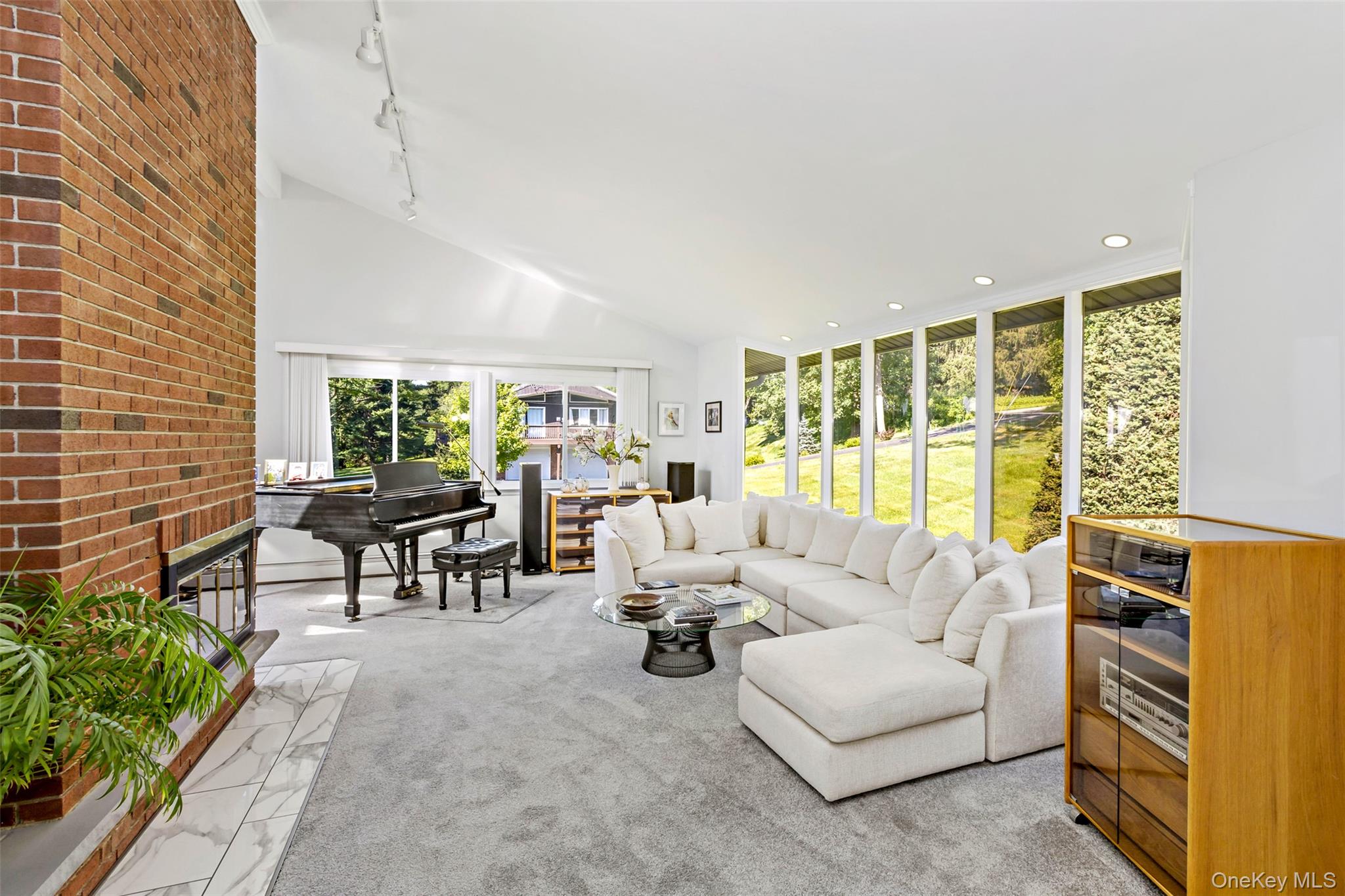 207 East Hook Road Hopewell Junction, NY 12533 - Photo 2 of 41 a living room with furniture and a large window