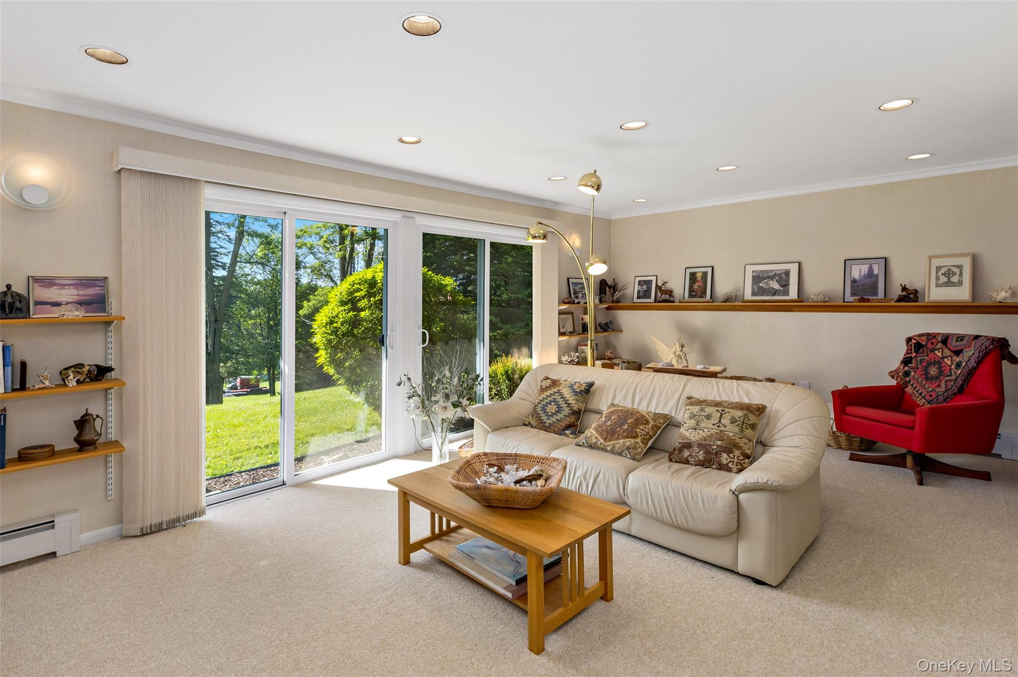 207 East Hook Road Hopewell Junction, NY 12533 - Photo 24 of 41 a living room with furniture and a floor to ceiling window