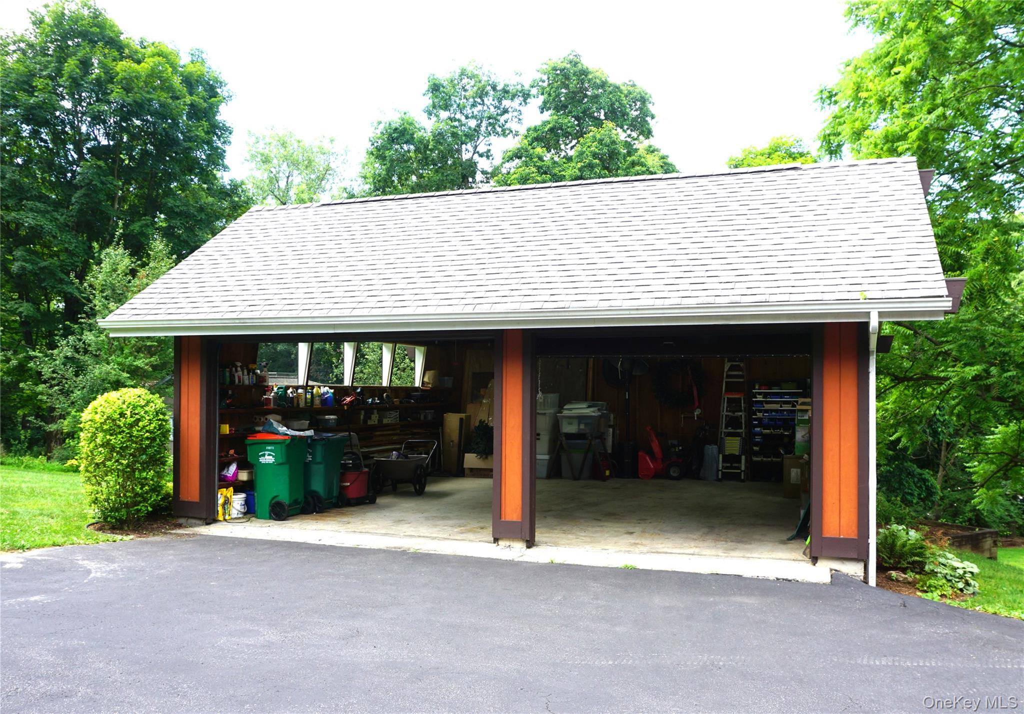 207 East Hook Road Hopewell Junction, NY 12533 - Photo 32 of 41 a view of a house with potted plants and a large tree