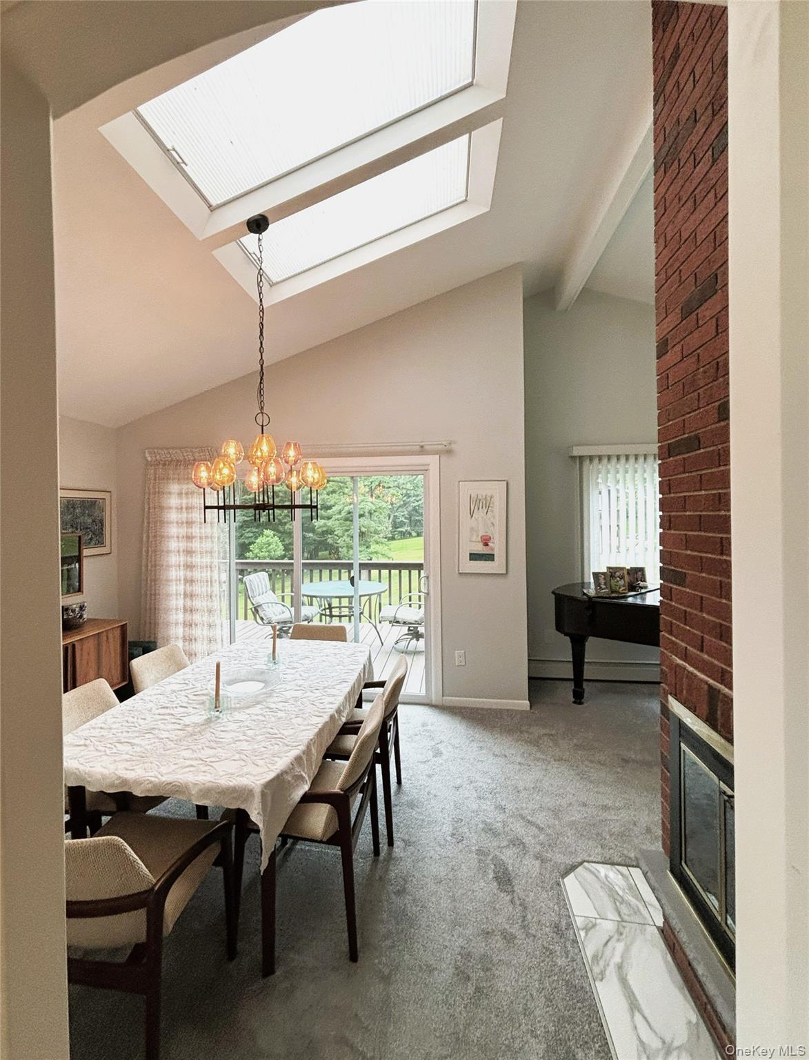 207 East Hook Road Hopewell Junction, NY 12533 - Photo 7 of 41 a view of a dining room with furniture window and outside view