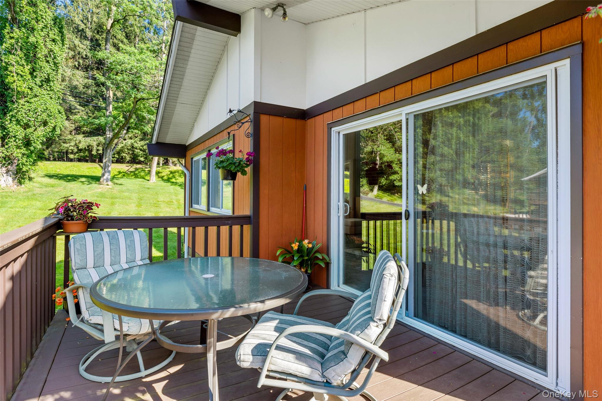207 East Hook Road Hopewell Junction, NY 12533 - Photo 9 of 41 a view of a patio with a table chairs and a backyard