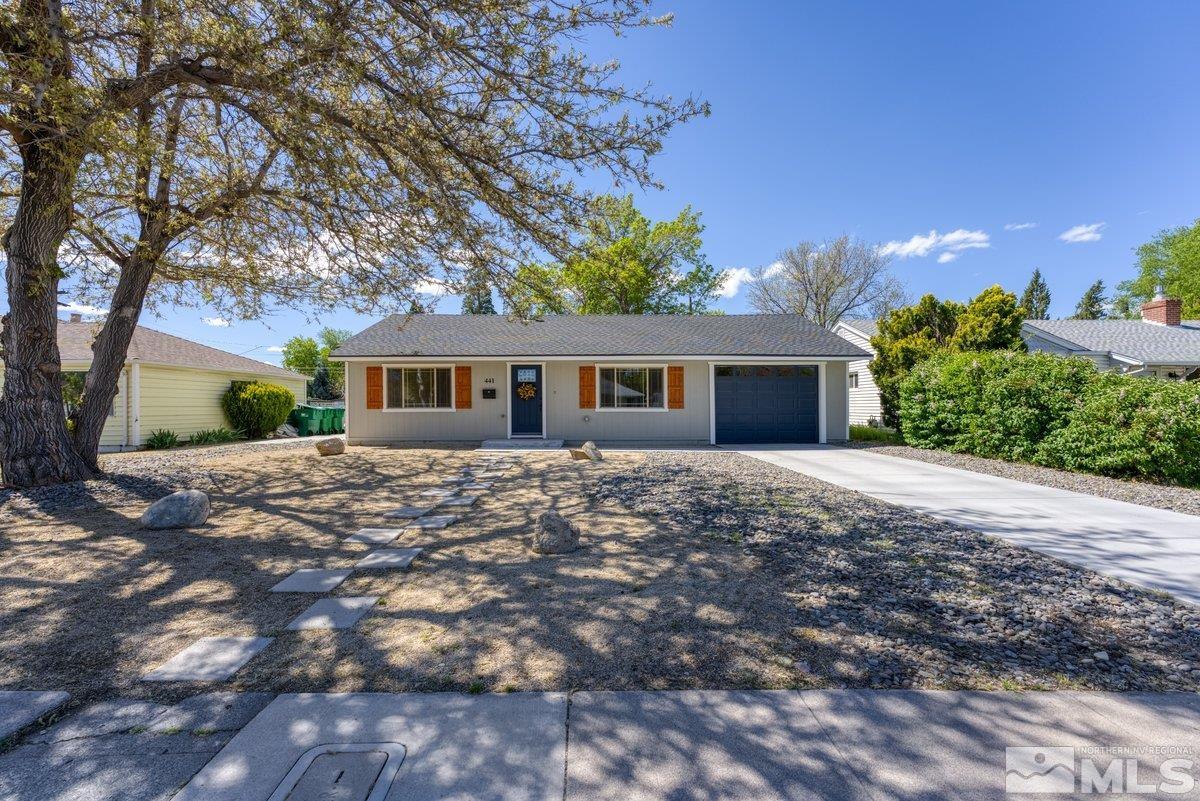 441 I Street Sparks, NV 89431 - Photo 1 of 16 a front view of a house with a yard