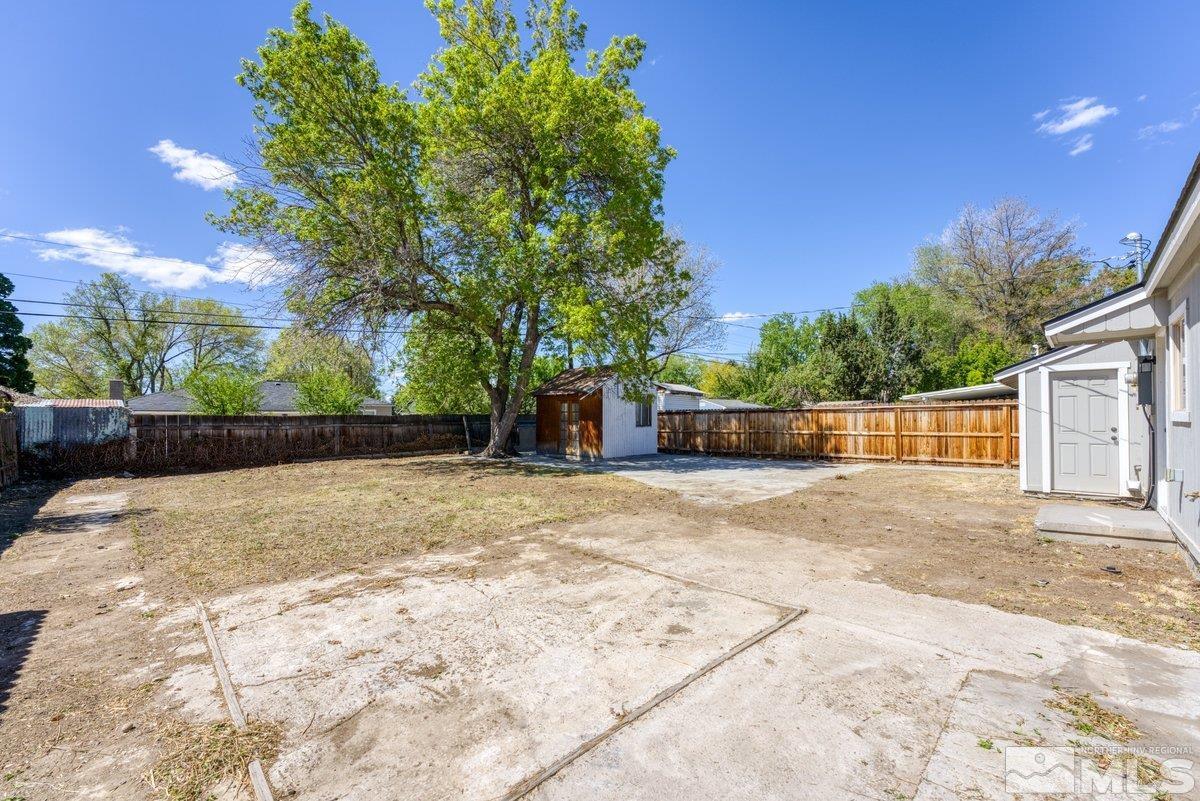 441 I Street Sparks, NV 89431 - Photo 13 of 16 a view of a backyard with large trees
