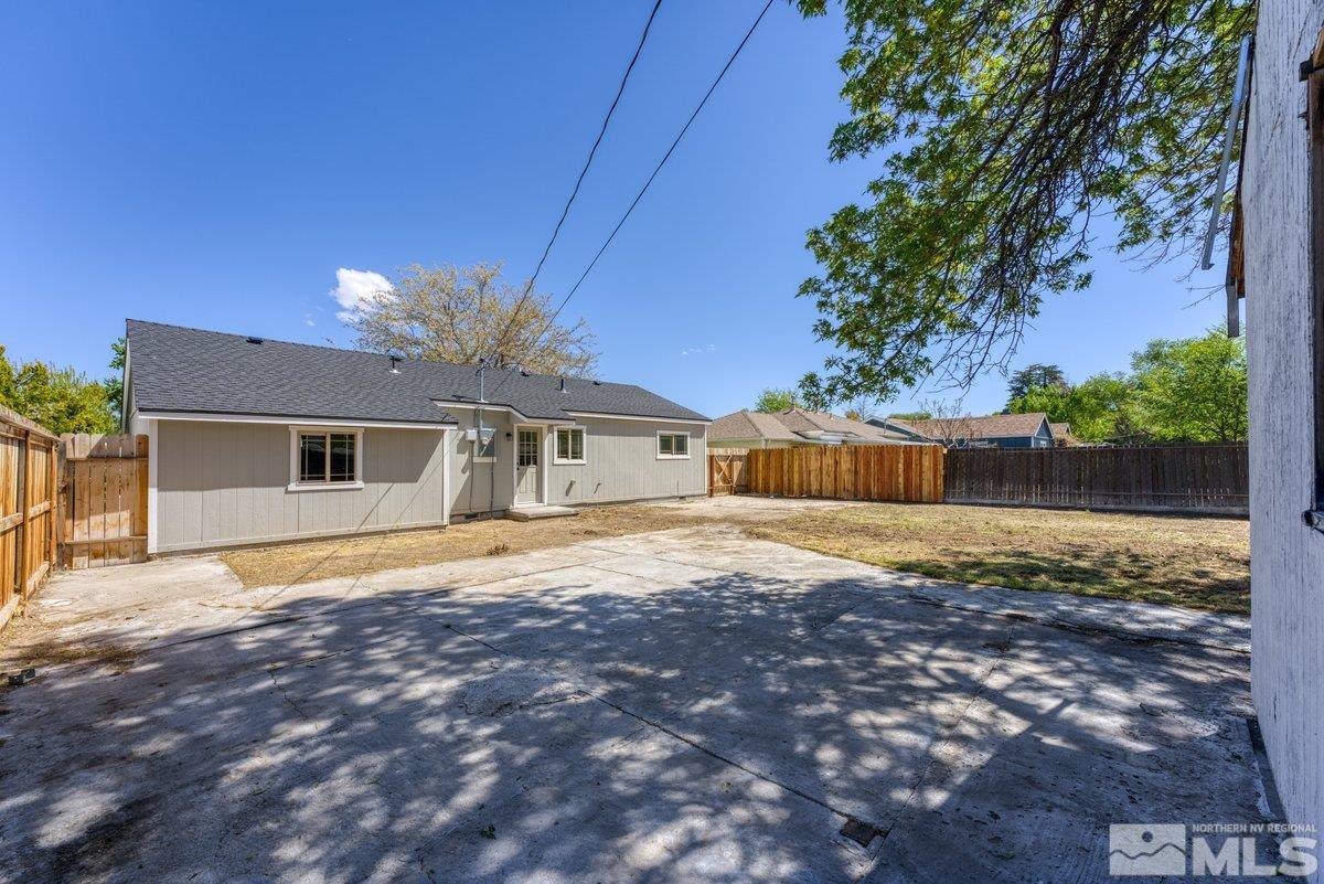 441 I Street Sparks, NV 89431 - Photo 15 of 16 a front view of a house with a yard and trees