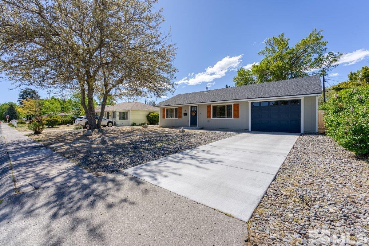 441 I Street Sparks, NV 89431 - Photo 2 of 16 front view of a house with a yard