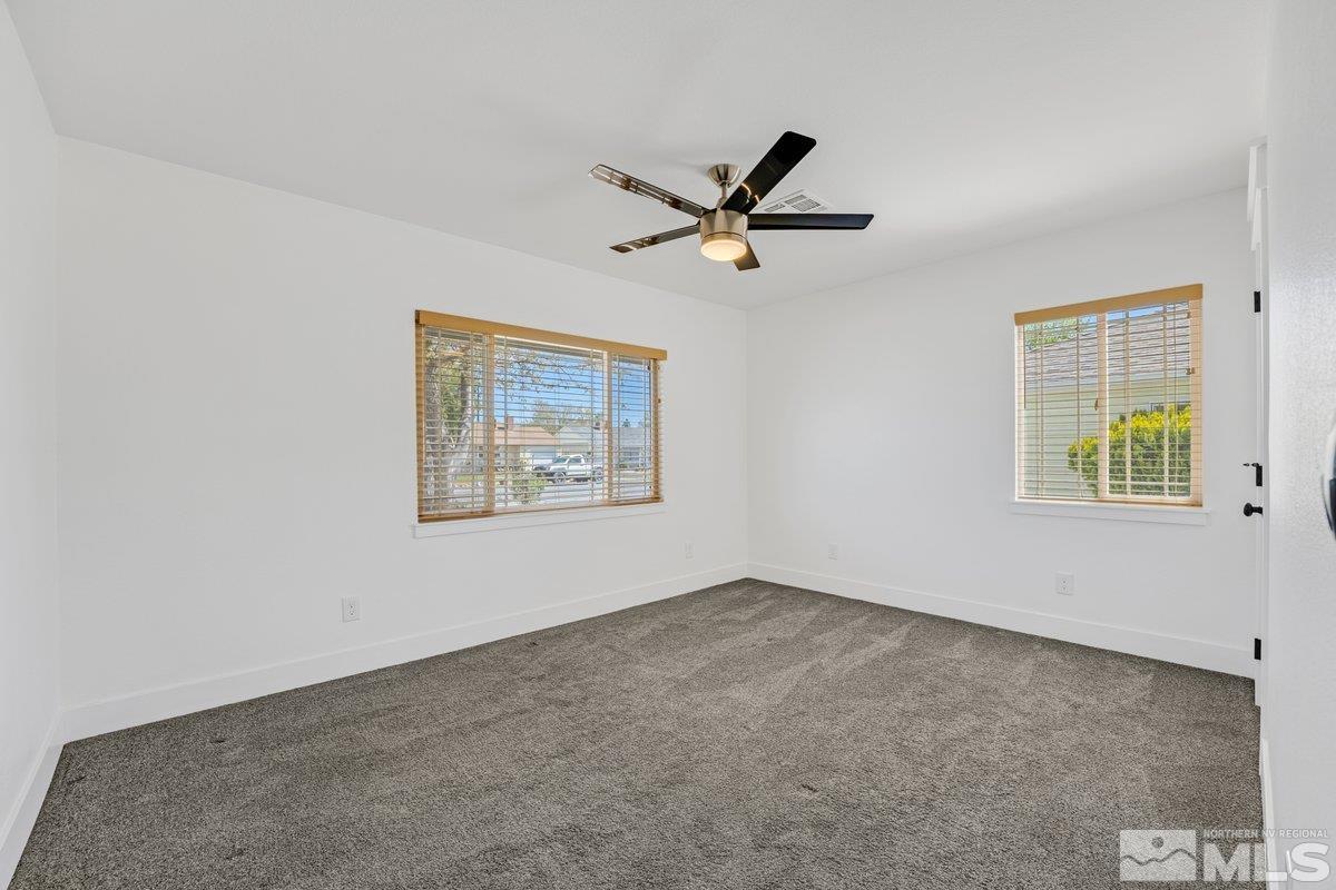 441 I Street Sparks, NV 89431 - Photo 8 of 16 a view of a big room with wooden floor and windows