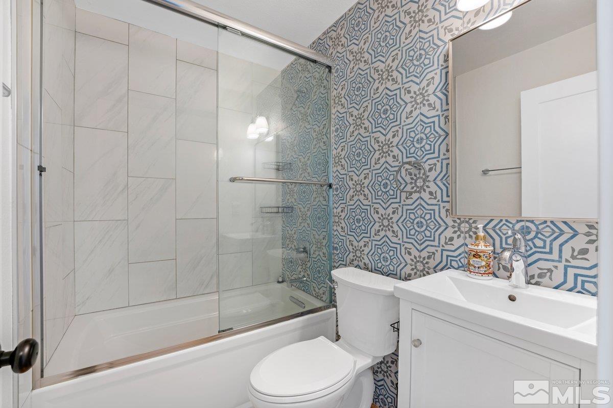 441 I Street Sparks, NV 89431 - Photo 10 of 16 a bathroom with a sink toilet and shower