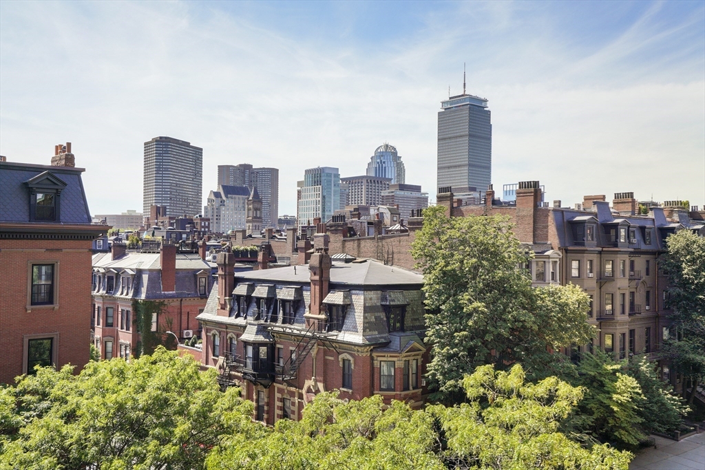 180 Beacon Street, Unit 6A Boston, MA 02116 - Photo 3 of 26 a view of a city with tall buildings