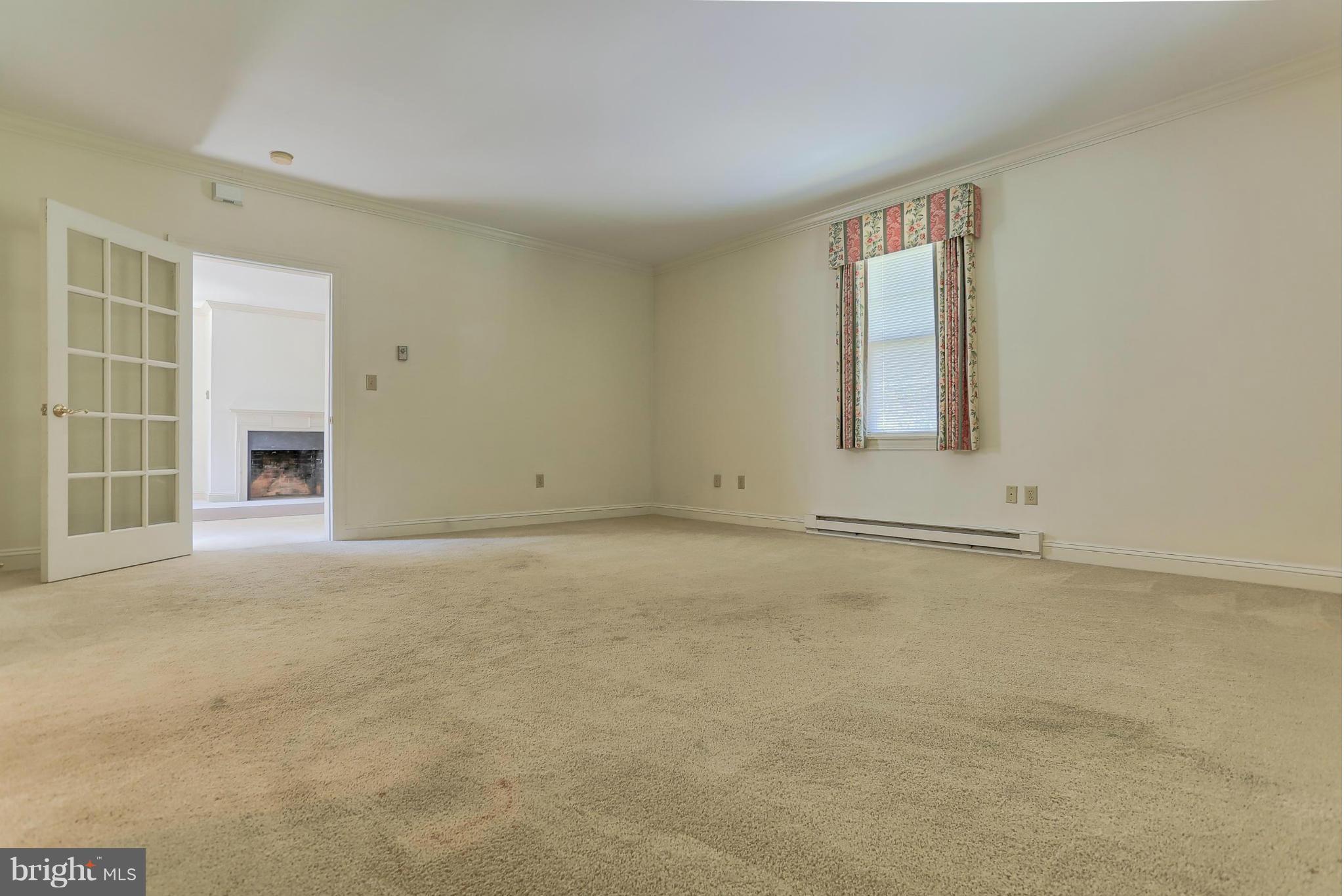 14611 Water Company Road Cascade, MD 21719 - Photo 11 of 30 an empty room with windows