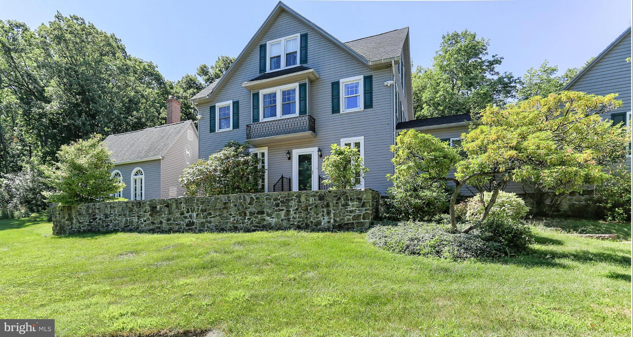 14611 Water Company Road Cascade, MD 21719 - Photo 3 of 30 a house that is sitting in the grass