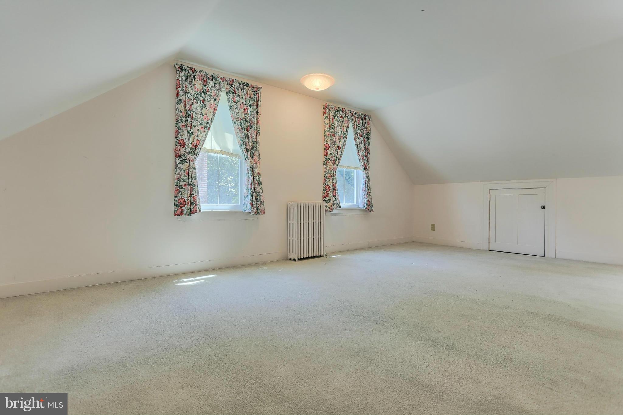 14611 Water Company Road Cascade, MD 21719 - Photo 29 of 30 an empty room with windows and closet