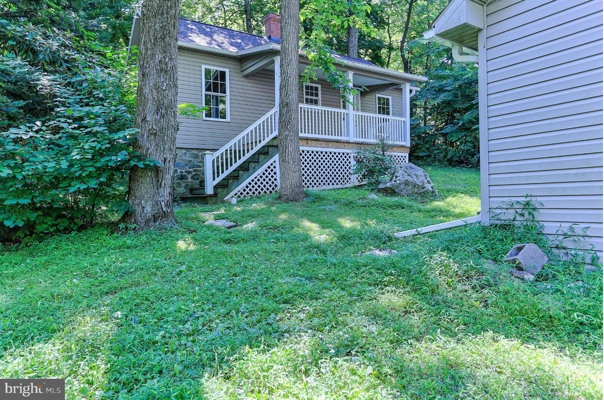 14611 Water Company Road Cascade, MD 21719 - Photo 5 of 30 a view of backyard of a house