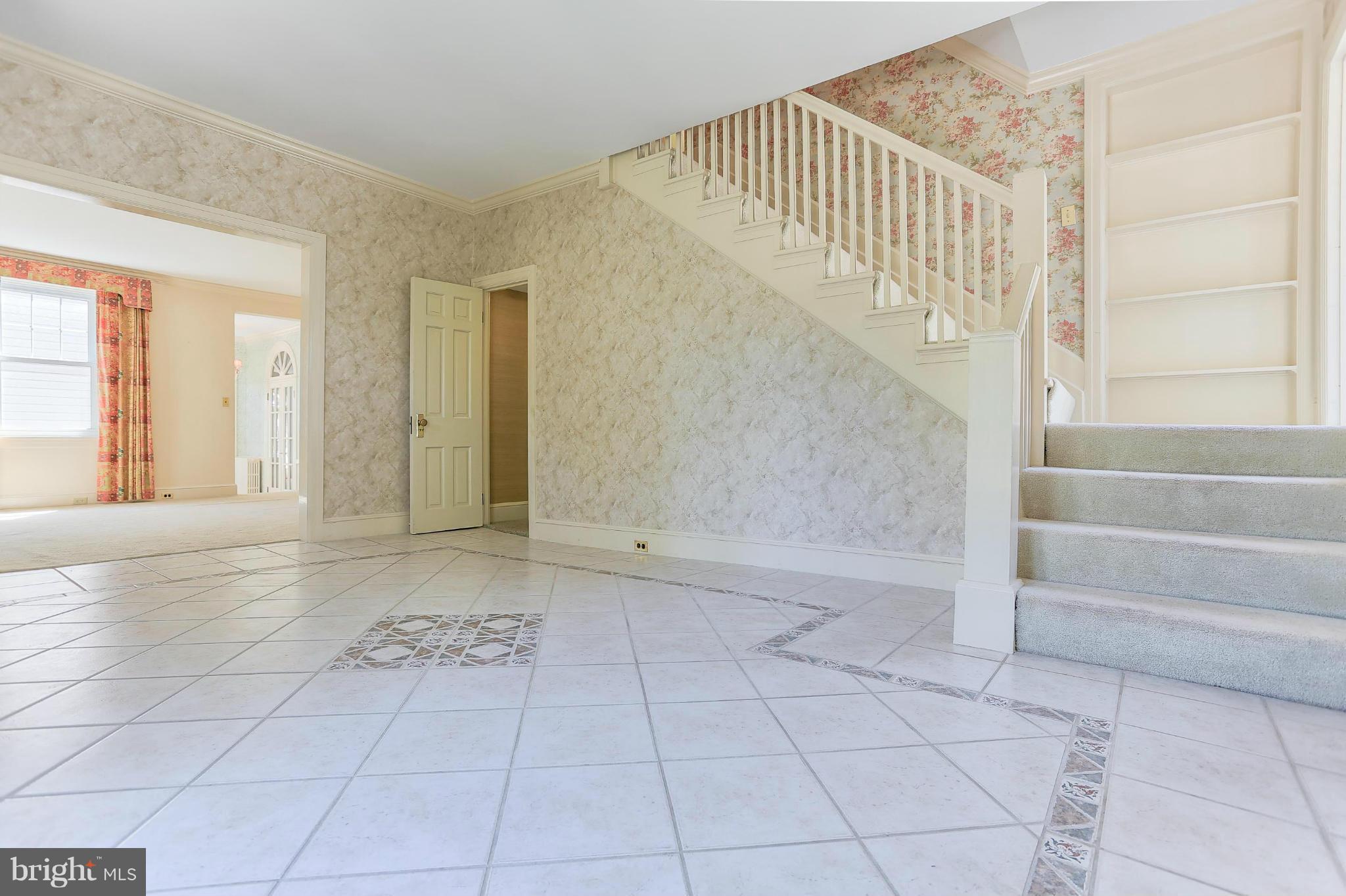 14611 Water Company Road Cascade, MD 21719 - Photo 9 of 30 a view of an entryway with staircase
