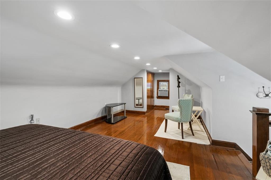 5517 Gibson Road Gibsonia, PA 15044 - Photo 19 of 43 a bedroom with a bed and a flat screen tv