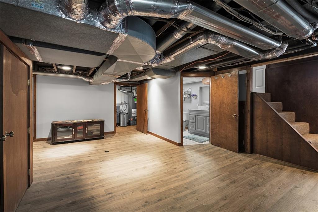 5517 Gibson Road Gibsonia, PA 15044 - Photo 21 of 43 a view of an empty room with wooden floor