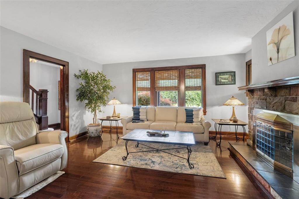 5517 Gibson Road Gibsonia, PA 15044 - Photo 5 of 43 a living room with furniture and a fireplace