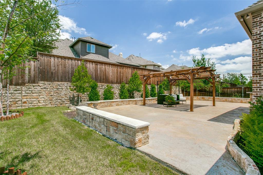 1518 Saddle Tree Road Frisco, TX 75036 - Photo 32 of 40 a view of a house with backyard and sitting area