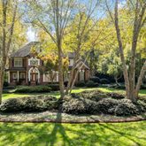 a view of a yard in front of a house