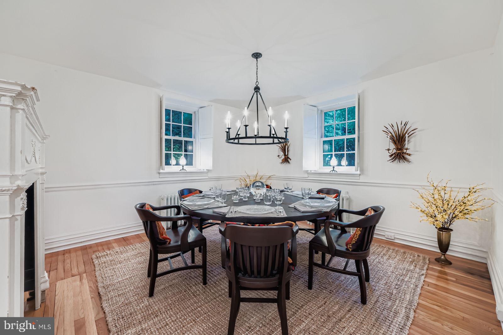2436 Pickwick Road Baltimore, MD 21207 - Photo 18 of 66 a view of a dining room with furniture and wooden floor