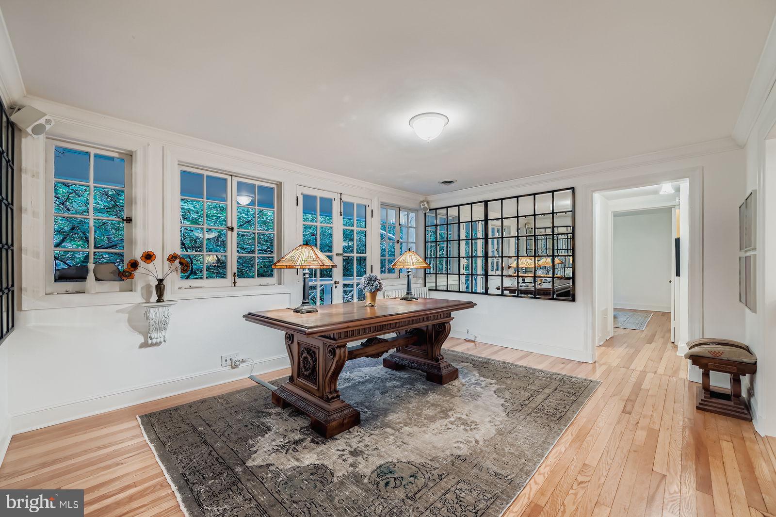 2436 Pickwick Road Baltimore, MD 21207 - Photo 28 of 66 a living room with furniture and a wooden floor