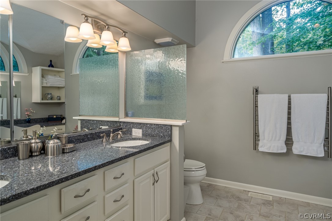 133 Daingerfield Road Williamsburg, VA 23185 - Photo 20 of 39 First floor primary bathroom has double vanities.